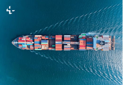 Aerial view of a cargo ship crossing the ocean